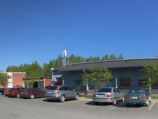 Cars parked at Riveria campus.